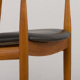 Illum Wilkkelso teak and black leather chair for Niels Eilersen Denmark s scaled
