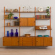 23050 Poul Cadovius style teak wall unit with 4 cabinets and expository shelf, Denmark 1970s-1