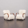 23143 Pair of Jindirch Halabala lounge chairs in natural long hair sheepskin, Czechia, 1940s-1
