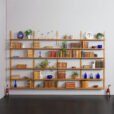 23234 Modular Scandinavian bookcase of 24 oak shelves with solid brass hangers in P. Sorensen and P. Cadovius style-1