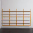23234 Modular Scandinavian bookcase of 24 oak shelves with solid brass hangers in P. Sorensen and P. Cadovius style-4