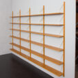 23234 Modular Scandinavian bookcase of 24 oak shelves with solid brass hangers in P. Sorensen and P. Cadovius style-5