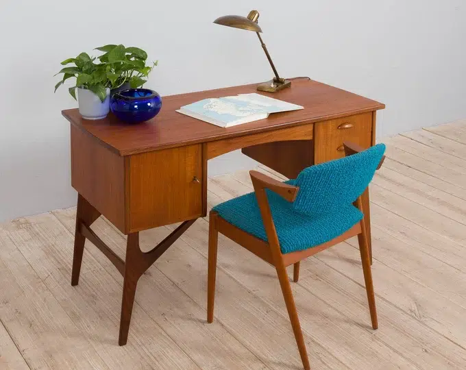 Danish mid century teak desk on sculptural base, 1960s.