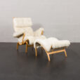 23536 Pernilla lounge chair with footstool by Bruno Mathsson in natural sheepskin-1