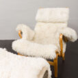 23536 Pernilla lounge chair with footstool by Bruno Mathsson in natural sheepskin-13