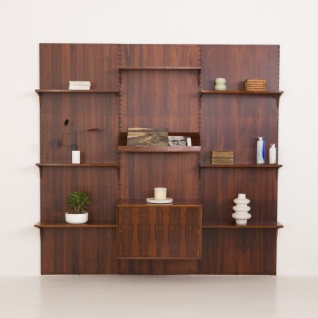24322 Poul Cadovius roswood wall unit on panels for Cado, Denmark 1960s. -1 Poul Cadovius rosewood wall unit on panels for Cado, Denmark, 1960s