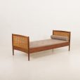 Teak and cane daybed attr. to Kai Winding