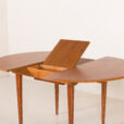 25547 Scandinavian round teak table with hidden extension, 1970s-15
