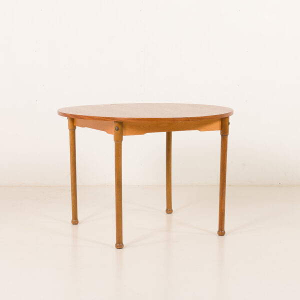 Teak round table with hidden extension, 1970s