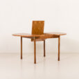 25546 Italian mid century round teak table with brass details, 1960s -7